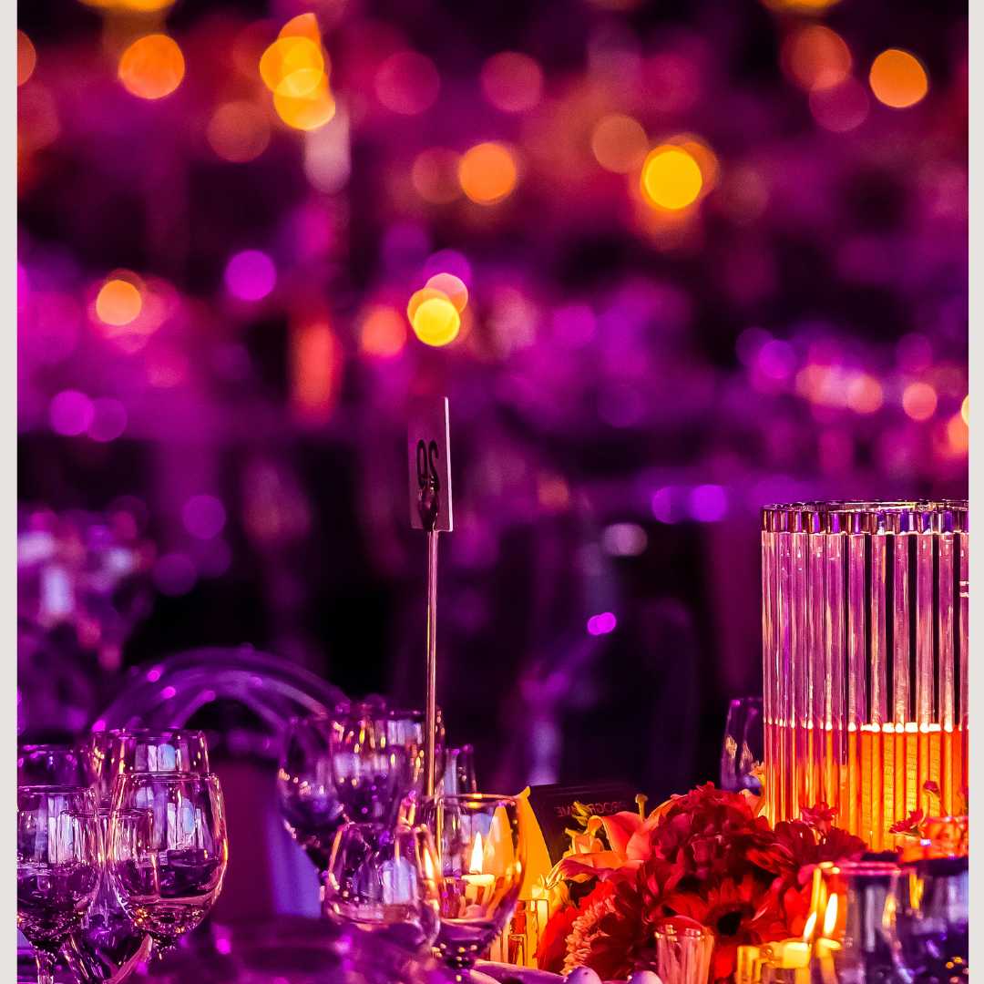 Glasses and flowers at a celebration